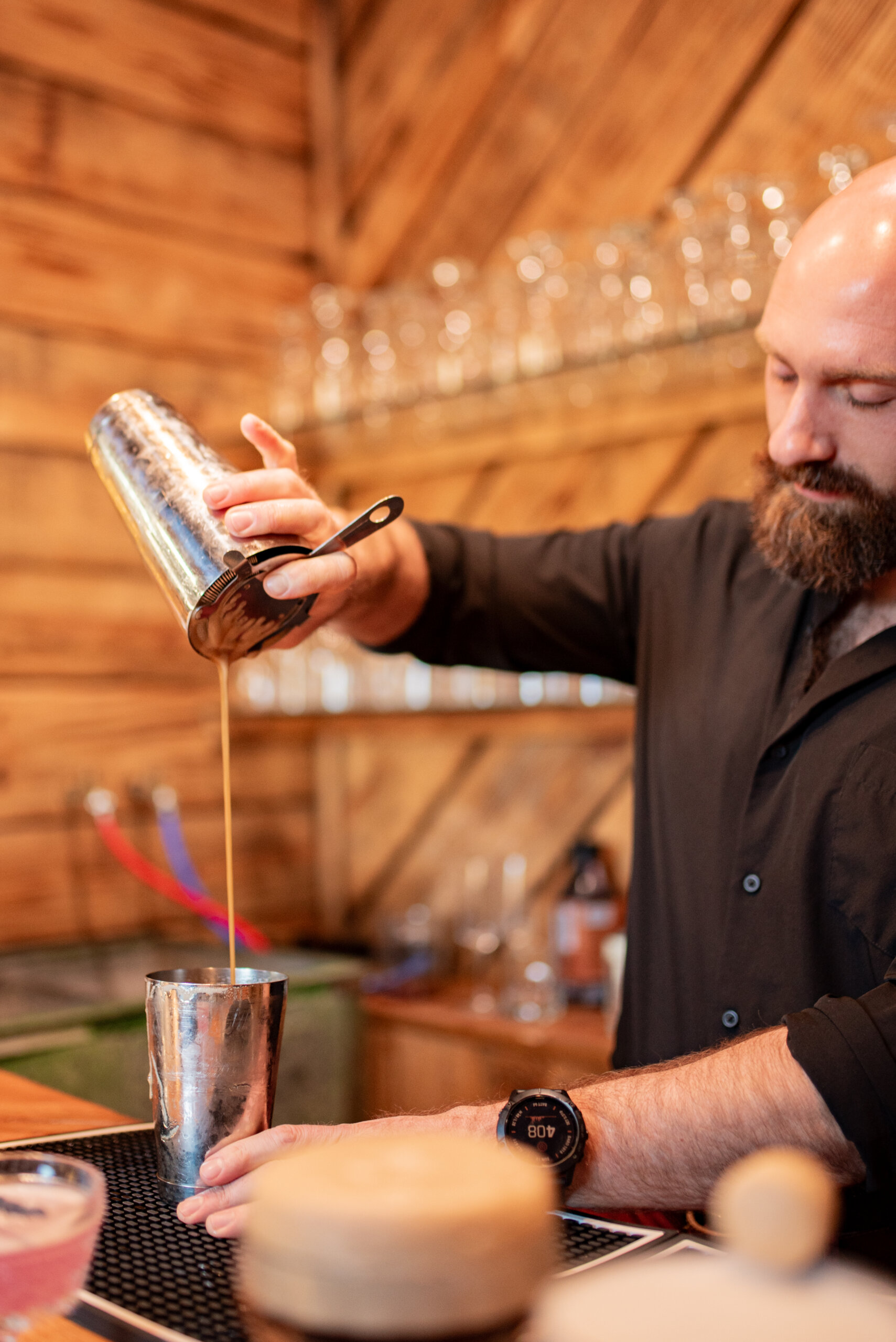 bartender making a custom cocktail