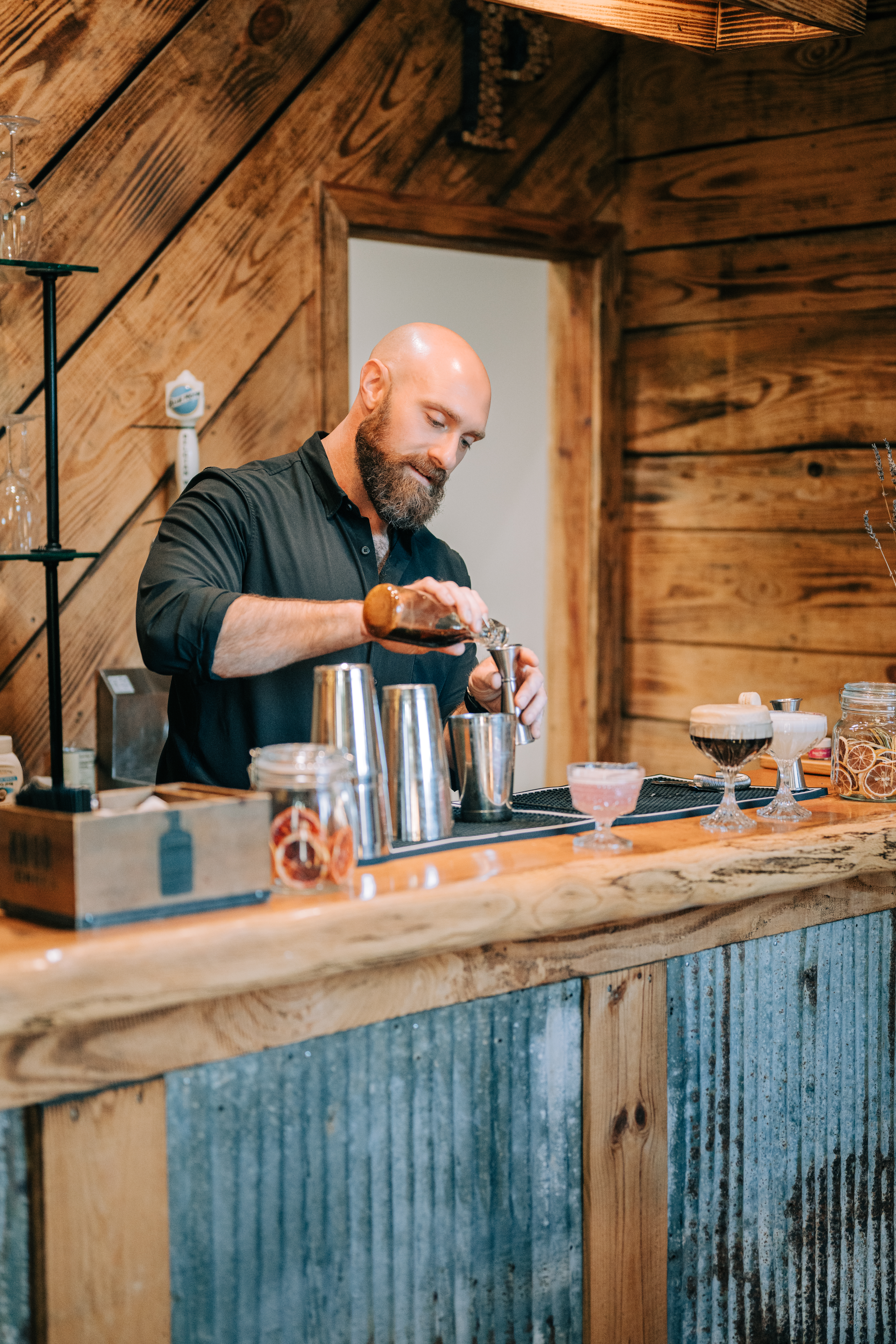 all shook up bartender making a cocktail